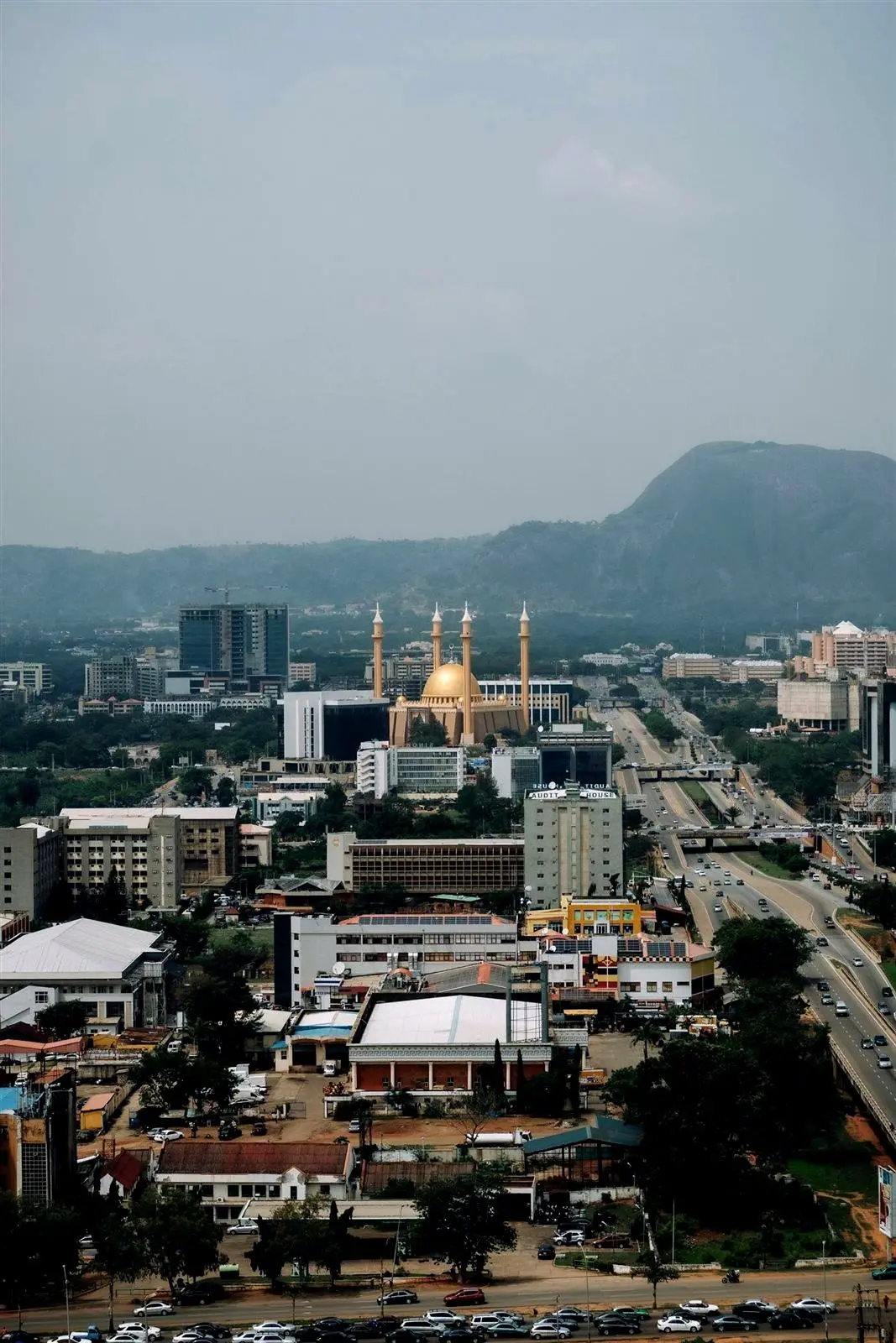 Abuja city centre with the National Mosque and hills beyond