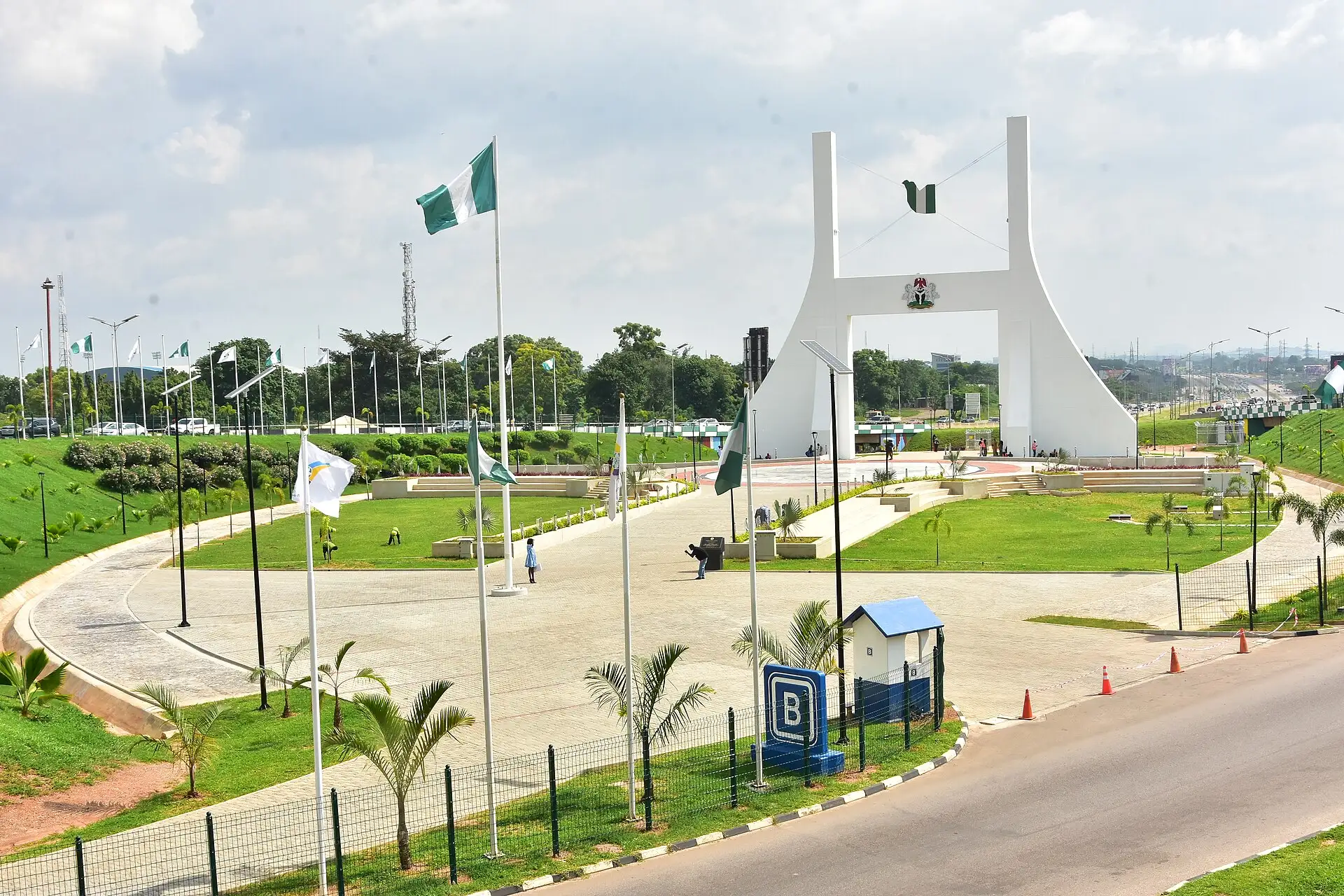 Abuja City Gate from the air, framed by green parkland