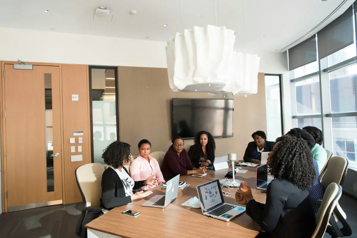 Women learning together around a meeting table