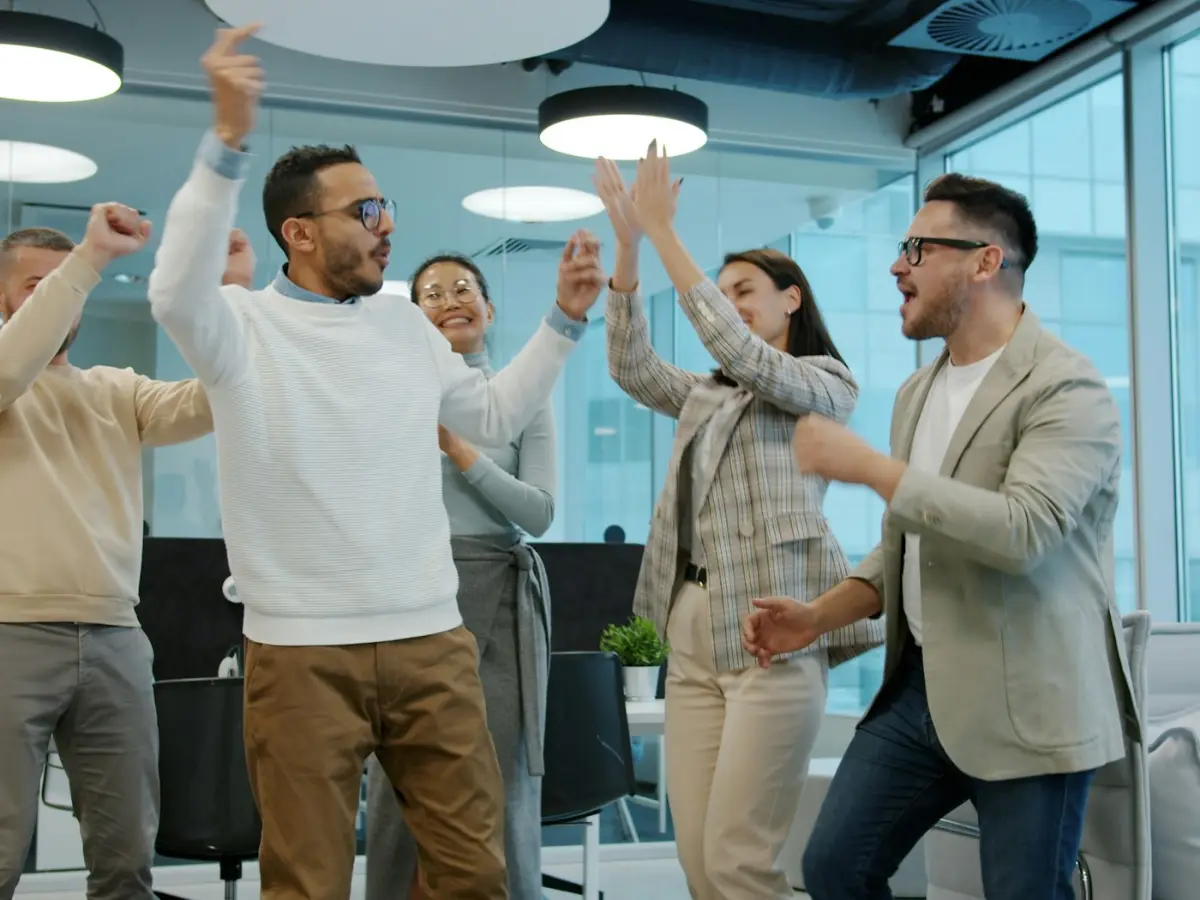 Colleagues celebrating a success together