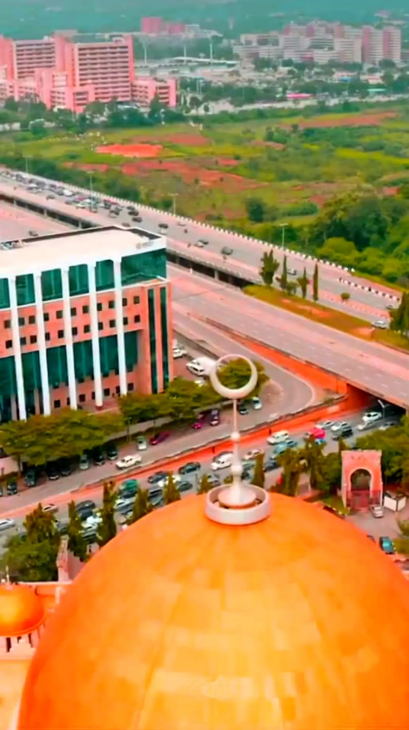 Abuja's National Mosque beneath a bright blue sky