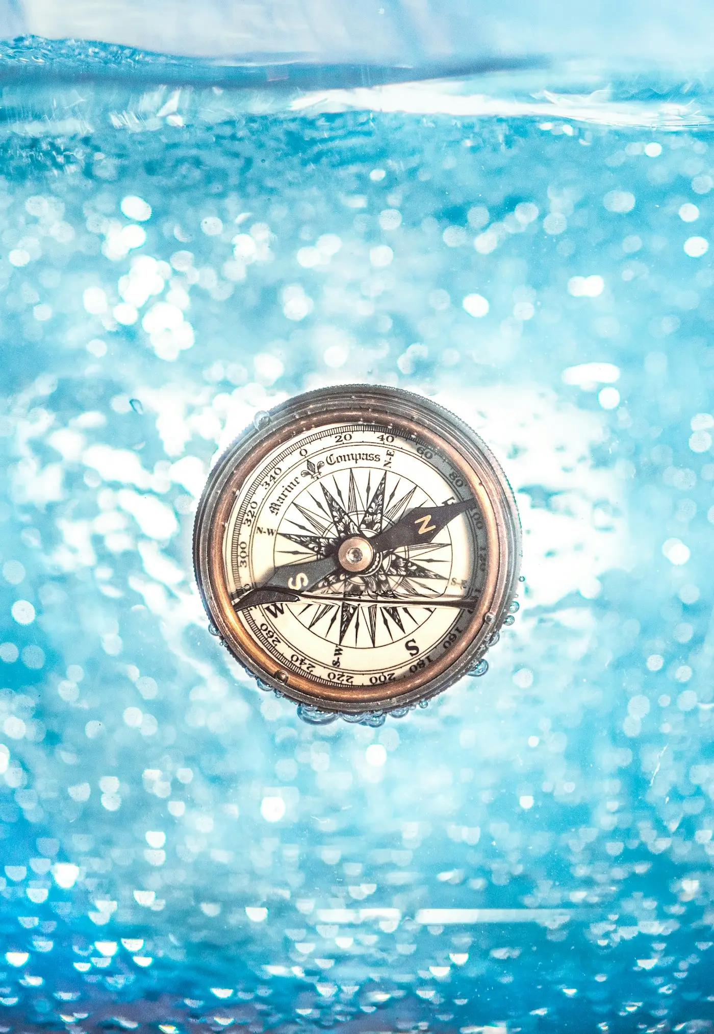 Round gold-colored compass