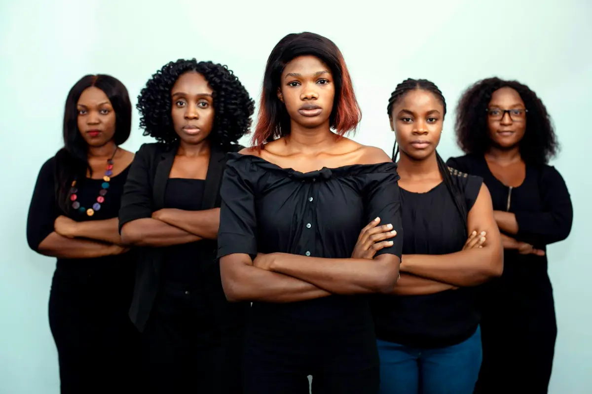 A group of confident African women professionals standing together